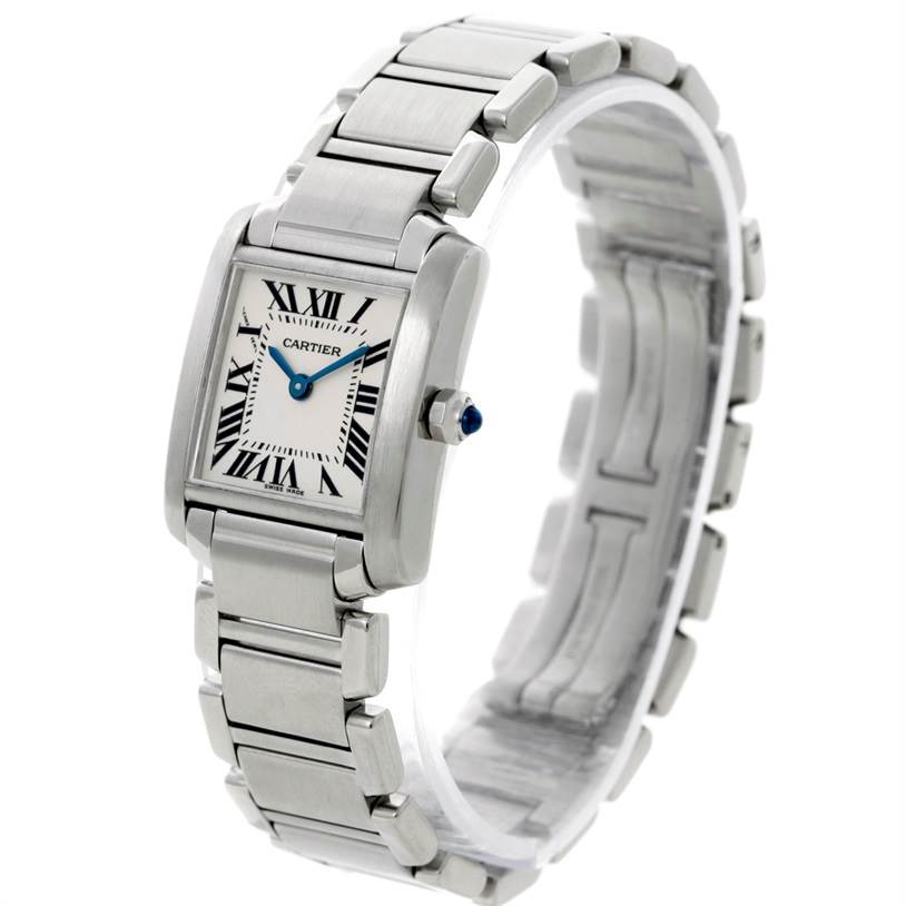 The image shows a Cartier Tank Francaise W51008Q3 Women's Stainless Steel Silver Dial W51008Q3 Women's Stainless Steel Silver Dial watch from an angled side view, highlighting the face, bracelet, and crown with blue gem.