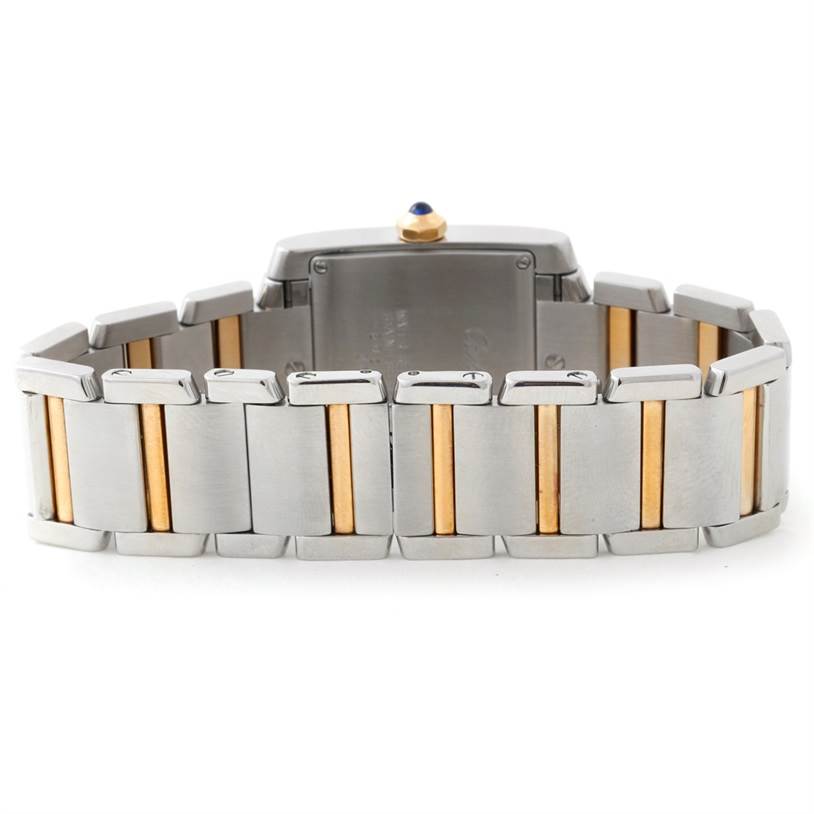 The image shows the backside of a Cartier Tank Francaise W51012Q4 Women's Steel and Gold (two tone) Silver Dial W51012Q4 Women's Steel and Gold (two tone) Silver Dial watch, focusing on the metal and rose gold bracelet.