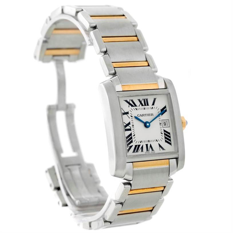 The image shows a Cartier Tank Francaise W51012Q4 Women's Steel and Gold (two tone) Silver Dial W51012Q4 Women's Steel and Gold (two tone) Silver Dial watch at an angle displaying its face, blue hands, Roman numerals, and metal bracelet.
