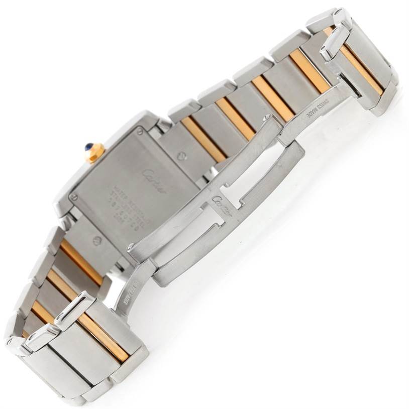 The image shows the back and bracelet of a Cartier Tank Francaise W51012Q4 Women's Steel and Gold (two tone) Silver Dial W51012Q4 Women's Steel and Gold (two tone) Silver Dial watch, highlighting its two-tone metal design and clasp.