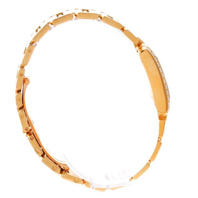 This image shows a Cartier Tank Francaise WE1001R8 Women's Yellow Gold Silver Dial WE1001R8 Women's Yellow Gold Silver Dial watch from the side, highlighting the gold band and case.