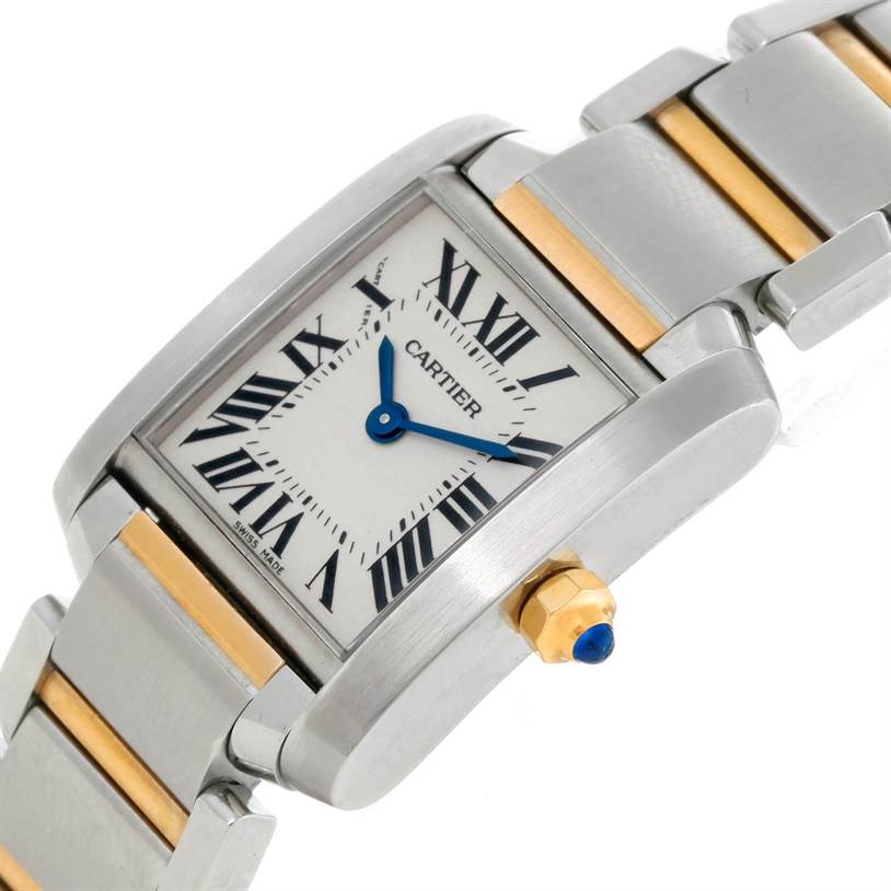 The image shows a Cartier Tank Francaise W51007Q4 Women's Steel and Gold (two tone) Silver Dial W51007Q4 Women's Steel and Gold (two tone) Silver Dial watch at a slight angle, detailing its face, bezel, crown, and part of the bracelet.