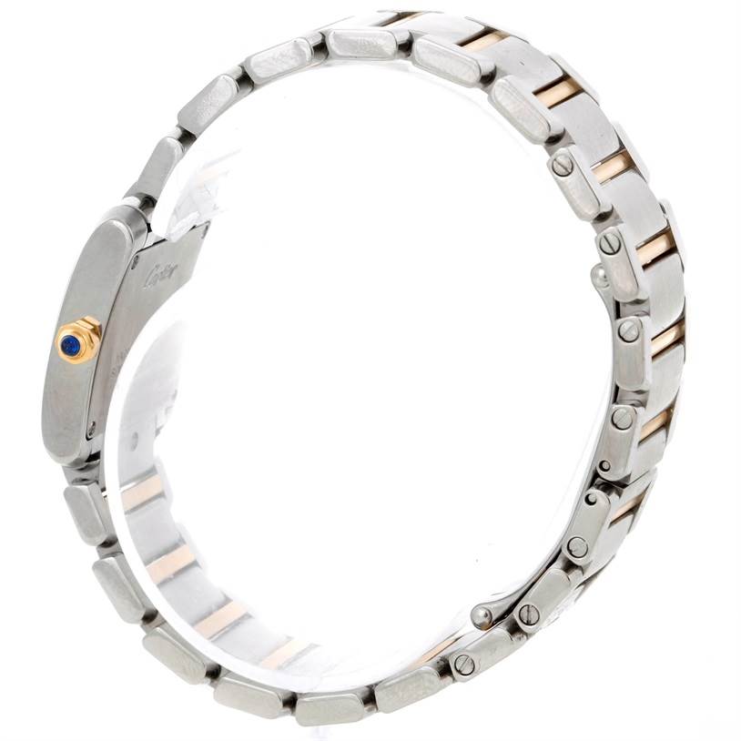 The image shows a side view of a Tank Francaise watch by Cartier, focusing on the band and crown details.