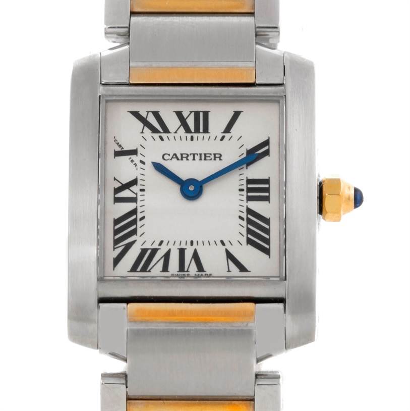 The image displays a front view of a Cartier Tank Francaise W51007Q4 Women's Steel and Gold (two tone) Silver Dial W51007Q4 Women's Steel and Gold (two tone) Silver Dial watch, highlighting its face, Roman numeral markers, and parts of its bracelet.