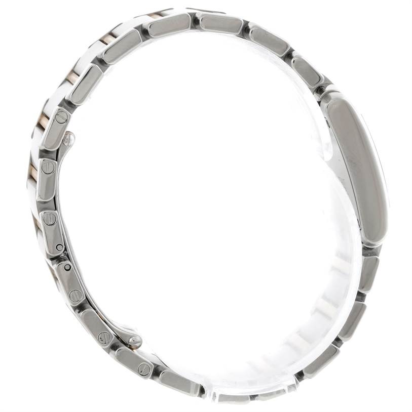 The image shows a side view of the bracelet links and the case of a Cartier Tank Française watch.