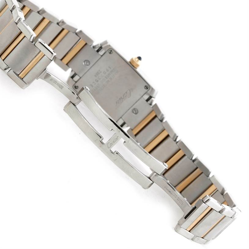 This image shows the back and bracelet clasp of a Cartier Tank Francaise W51007Q4 Women's Steel and Gold (two tone) Silver Dial W51007Q4 Women's Steel and Gold (two tone) Silver Dial watch, displaying the metal links and part of the case back.