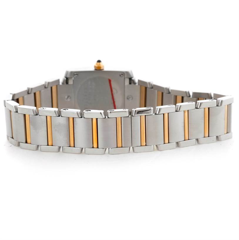 This image shows the backside of the bracelet and case of a Cartier Tank Francaise W51007Q4 Women's Steel and Gold (two tone) Silver Dial W51007Q4 Women's Steel and Gold (two tone) Silver Dial watch, highlighting its two-tone metal links.