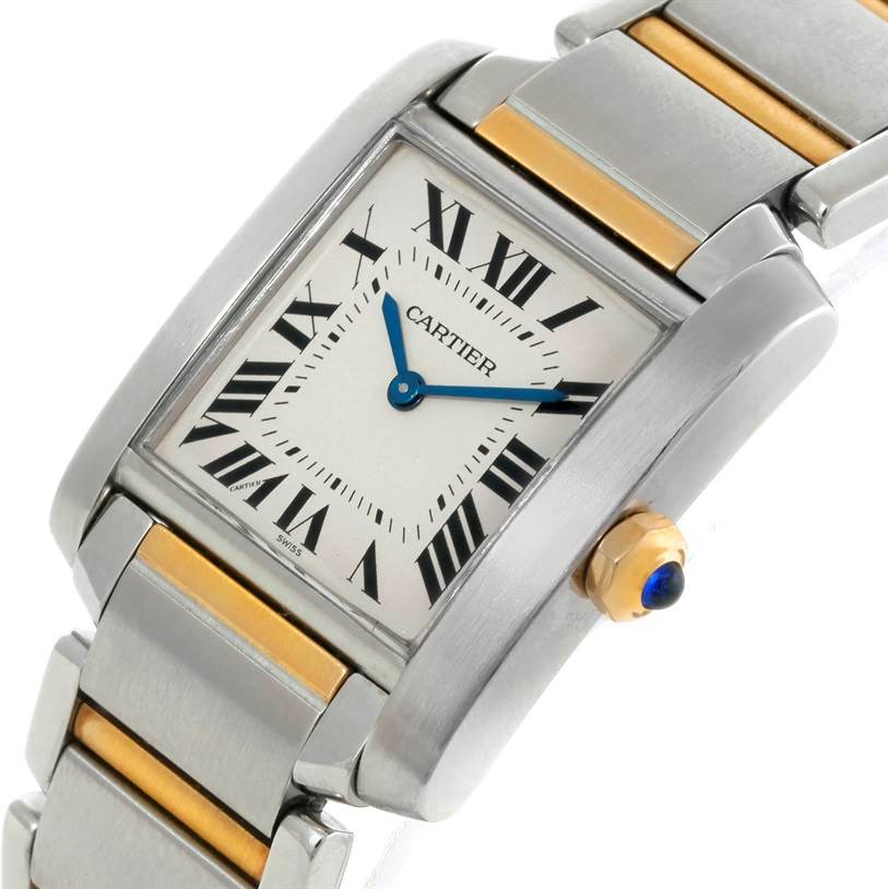 The image shows a close-up angle of the Cartier Tank Francaise W51006Q4 Women's Steel and Gold (two tone) Silver Dial W51006Q4 Women's Steel and Gold (two tone) Silver Dial watch's face and part of its bracelet, highlighting its dial, crown, and two-tone metal design.