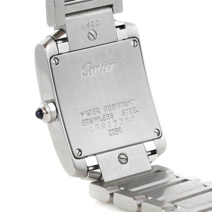 The image shows the back of a Cartier Tank Francaise W51008Q3 Women's Stainless Steel Silver Dial W51008Q3 Women's Stainless Steel Silver Dial watch, including the case back, crown, and part of the bracelet.