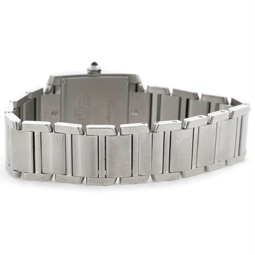 The image shows a rear view of a Cartier Tank Francaise W51011Q3 Women's Stainless Steel Silver Dial W51011Q3 Women's Stainless Steel Silver Dial watch, highlighting the bracelet and case back.