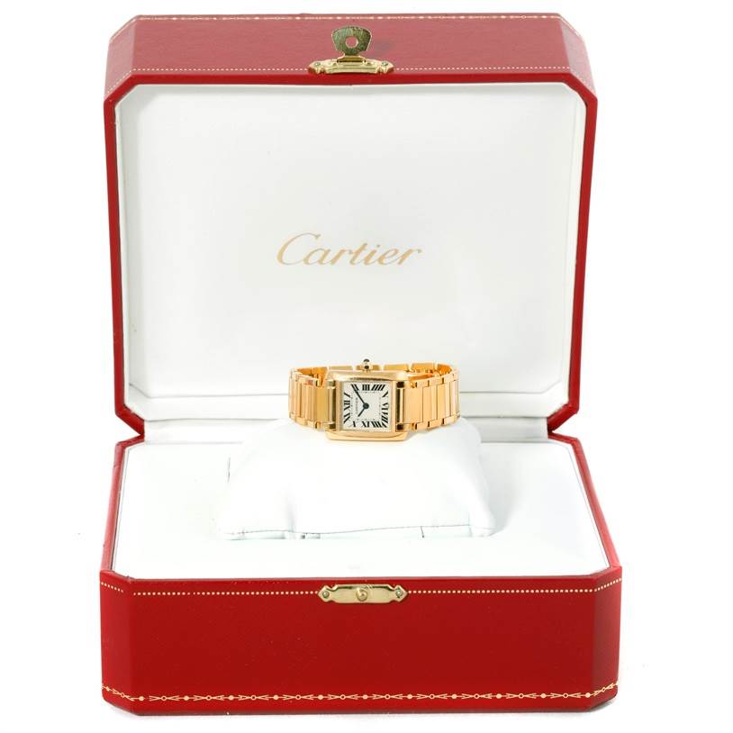 The Cartier Tank Francaise W50002N2 Women's Yellow Gold Silver Dial W50002N2 Women's Yellow Gold Silver Dial watch is displayed facing forward in its open red and white Cartier box.
