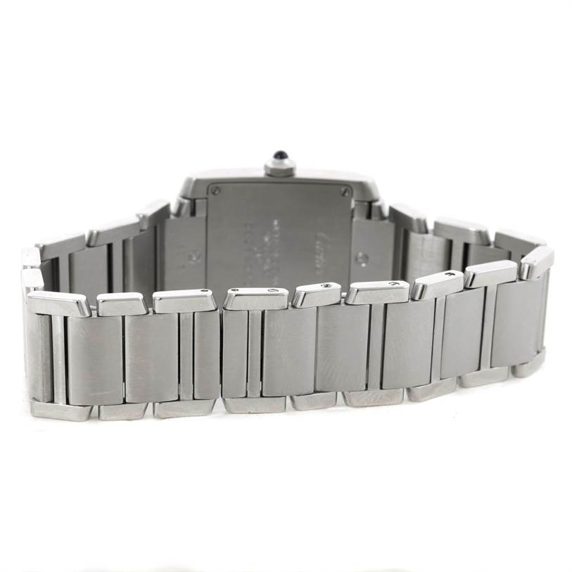 This image shows the back and bracelet of the Cartier Tank Française watch.
