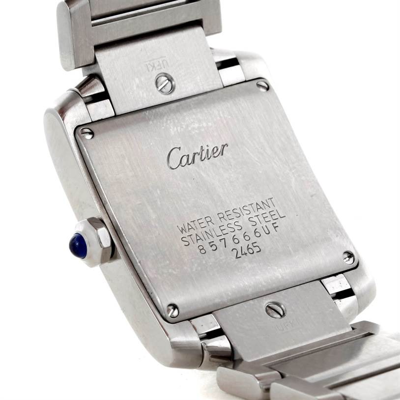 This image shows the back case and part of the band of a Cartier Tank Française watch.