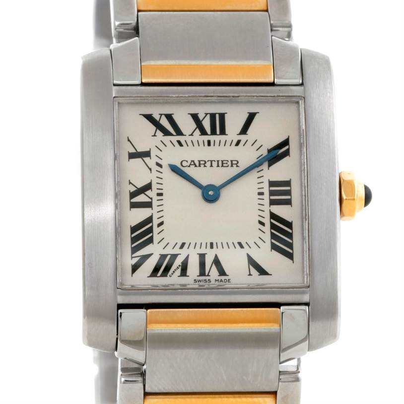 The image shows a close-up view of the face and part of the bracelet of a Cartier Tank Française watch.