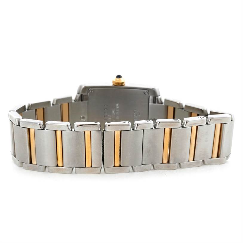 The image shows the back of a Cartier Tank Francaise W51012Q4 Women's Steel and Gold (two tone) Silver Dial W51012Q4 Women's Steel and Gold (two tone) Silver Dial watch, highlighting its bracelet with silver and gold-tone links.