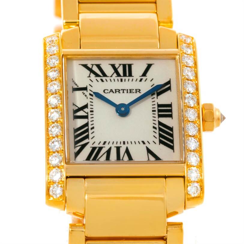 The image shows a front view of the Cartier Tank Française watch, highlighting the dial, bezel with diamonds, and a portion of the bracelet.