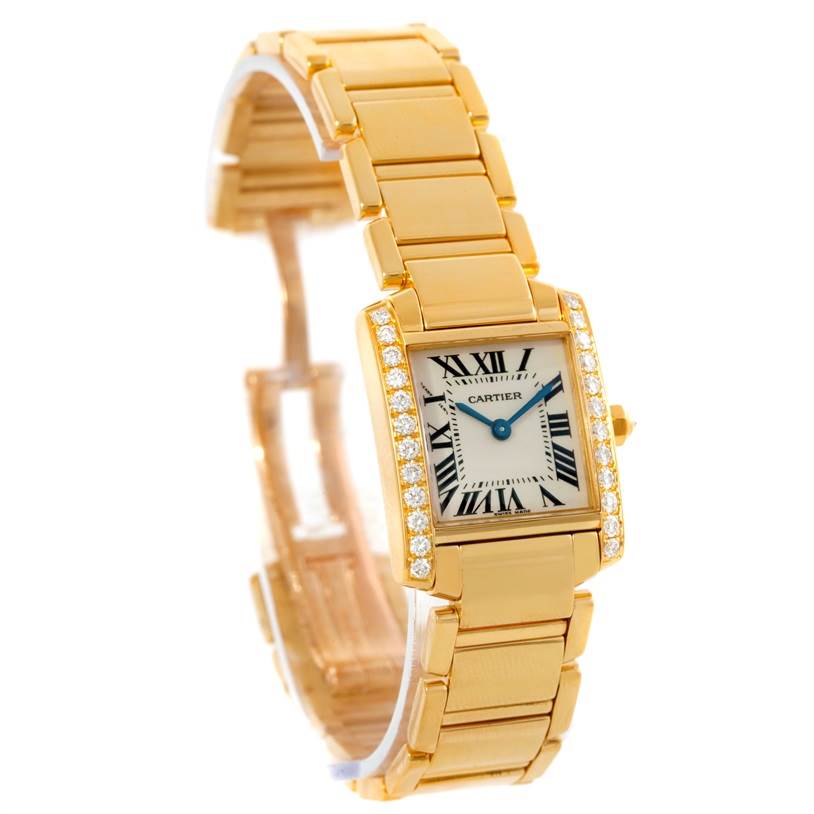 This image shows a Cartier Tank Française watch with a gold bracelet, square dial, and diamond accents, captured at a three-quarter angle.