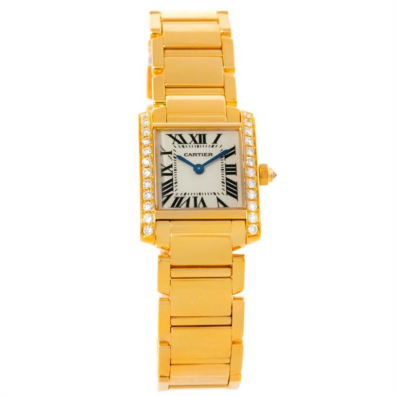 The Cartier Tank Francaise WE1001R8 Women's Yellow Gold Silver Dial WE1001R8 Women's Yellow Gold Silver Dial watch is shown from a top-down angle, displaying its gold bracelet, diamond-set case, and Roman numeral dial.
