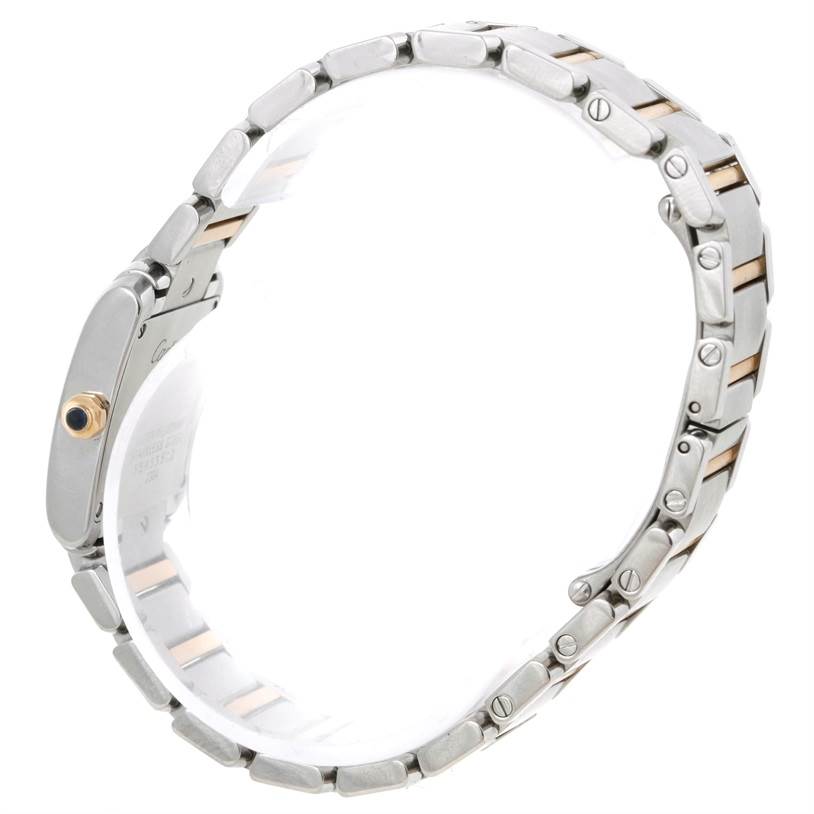The image shows a side view of the Cartier Tank Francaise W51007Q4 Women's Steel and Gold (two tone) Silver Dial W51007Q4 Women's Steel and Gold (two tone) Silver Dial watch, focusing on the bracelet and crown.