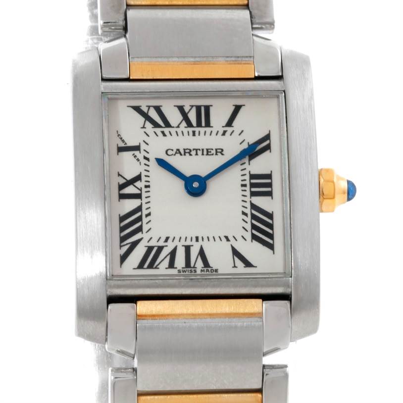 This image shows a close-up of the Cartier Tank Francaise W51007Q4 Women's Steel and Gold (two tone) Silver Dial W51007Q4 Women's Steel and Gold (two tone) Silver Dial watch, highlighting its face, hands, and part of its bracelet.