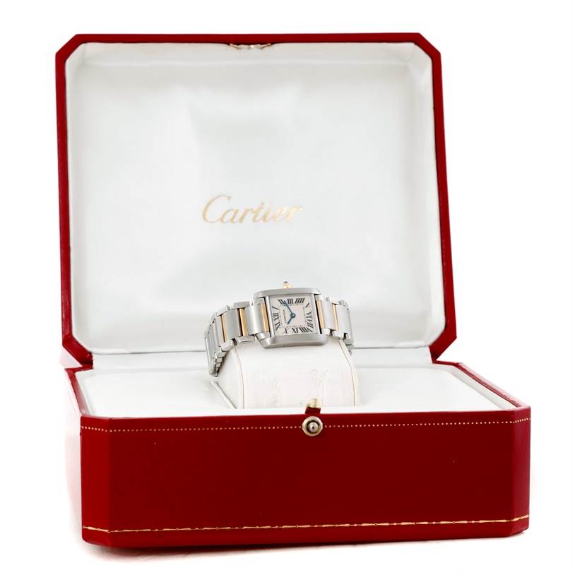The Cartier Tank Française watch is shown front-facing, displayed in an open red Cartier box.