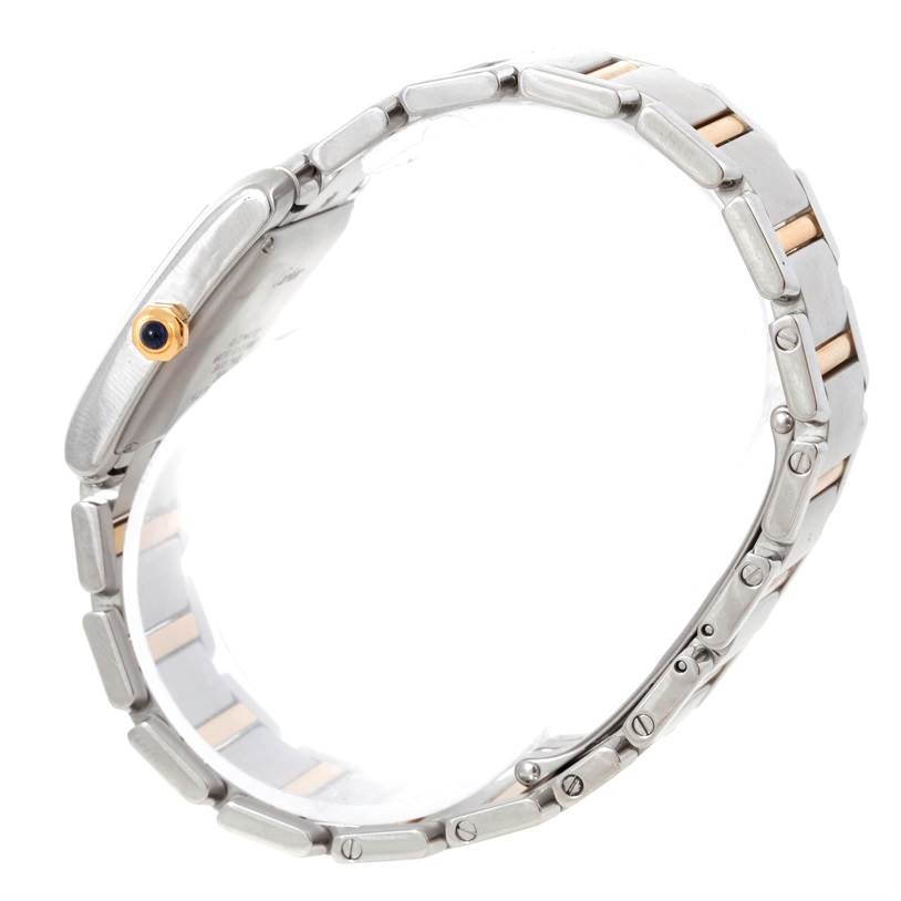 This image shows the side profile and bracelet of the Cartier Tank Française watch, highlighting the linked design and crown.