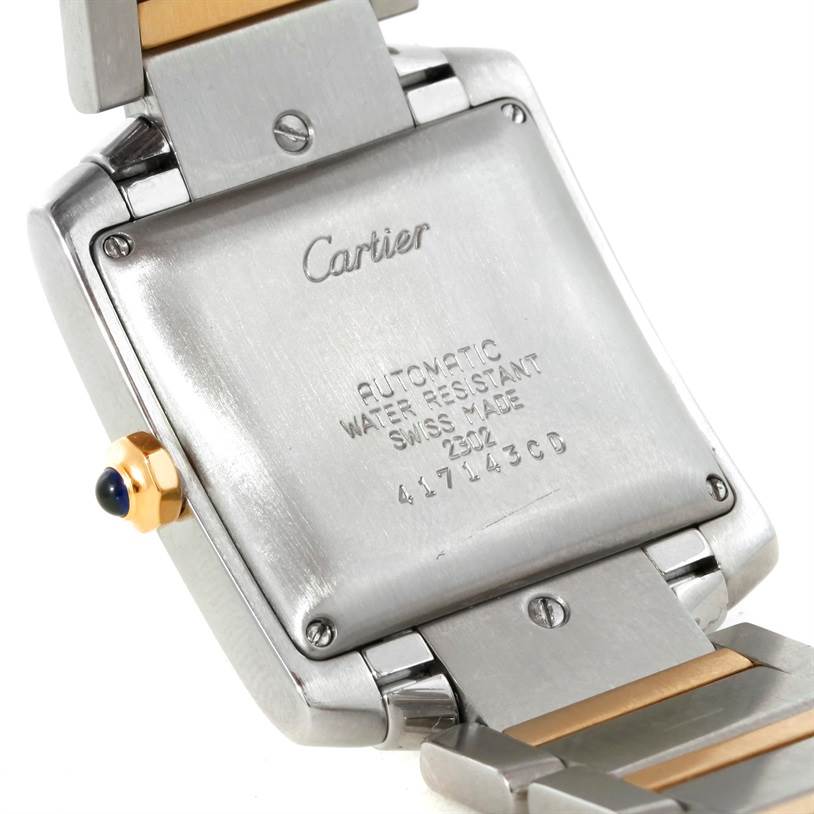 The image shows the backside and part of the bracelet of a Cartier Tank Française watch.