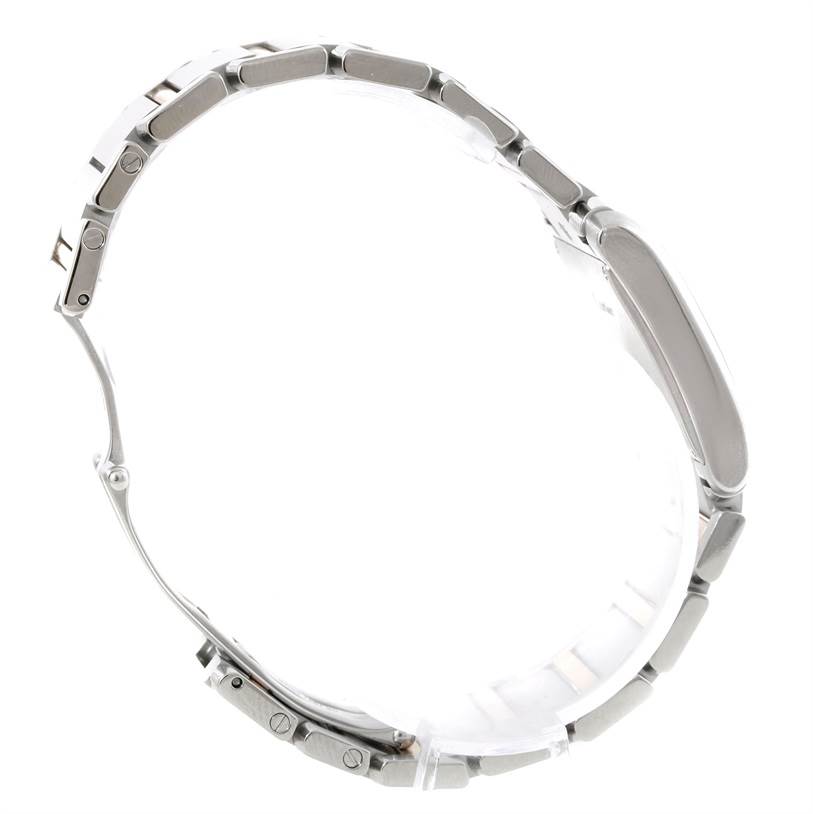 The image shows a side profile of the Cartier Tank Francaise W51012Q4 Women's Steel and Gold (two tone) Silver Dial W51012Q4 Women's Steel and Gold (two tone) Silver Dial watch, highlighting its metal bracelet and case thickness.