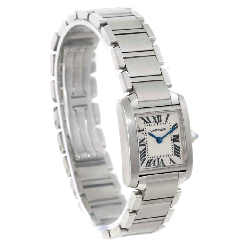 The image shows a Cartier Tank Française watch from a front angle, highlighting its rectangular dial, blue hands, and metal bracelet.