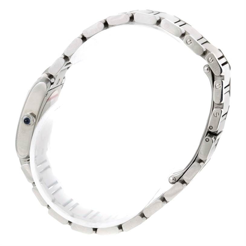 Side view of the Cartier Tank Française, showcasing the bracelet and crown with sapphire cabochon.