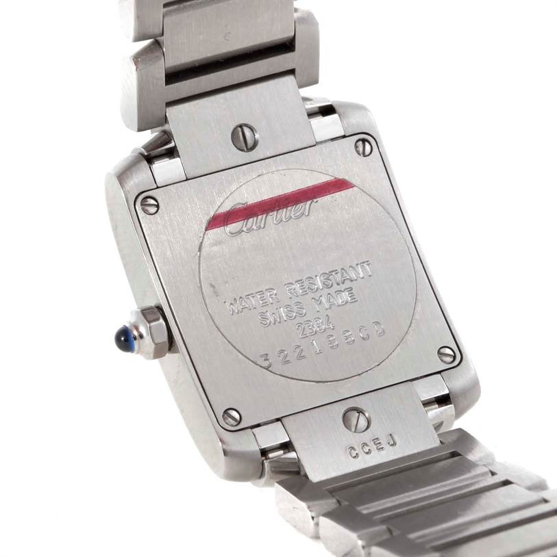 The image shows the back case and part of the bracelet of a Cartier Tank Francaise W51008Q3 Women's Stainless Steel Silver Dial W51008Q3 Women's Stainless Steel Silver Dial watch.