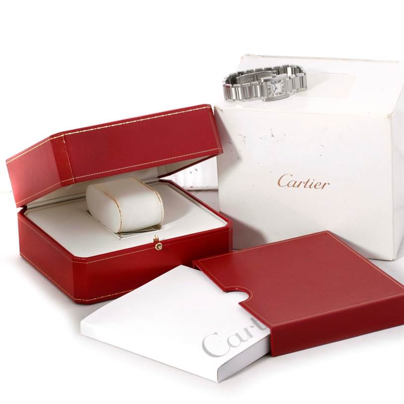The image shows a Cartier Tank Francaise W51008Q3 Women's Stainless Steel Silver Dial W51008Q3 Women's Stainless Steel Silver Dial watch with its red and white packaging boxes, displayed from an angled view.