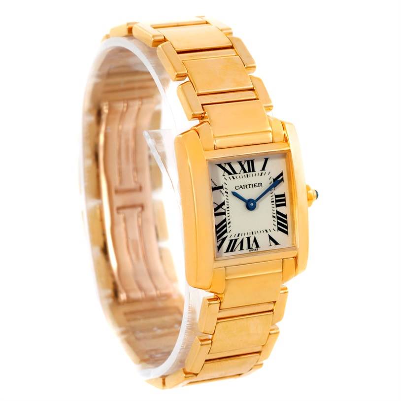 The Cartier Tank Francaise W50002N2 Women's Yellow Gold Silver Dial W50002N2 Women's Yellow Gold Silver Dial watch is shown from an angled top view, highlighting its rectangular dial and gold bracelet.