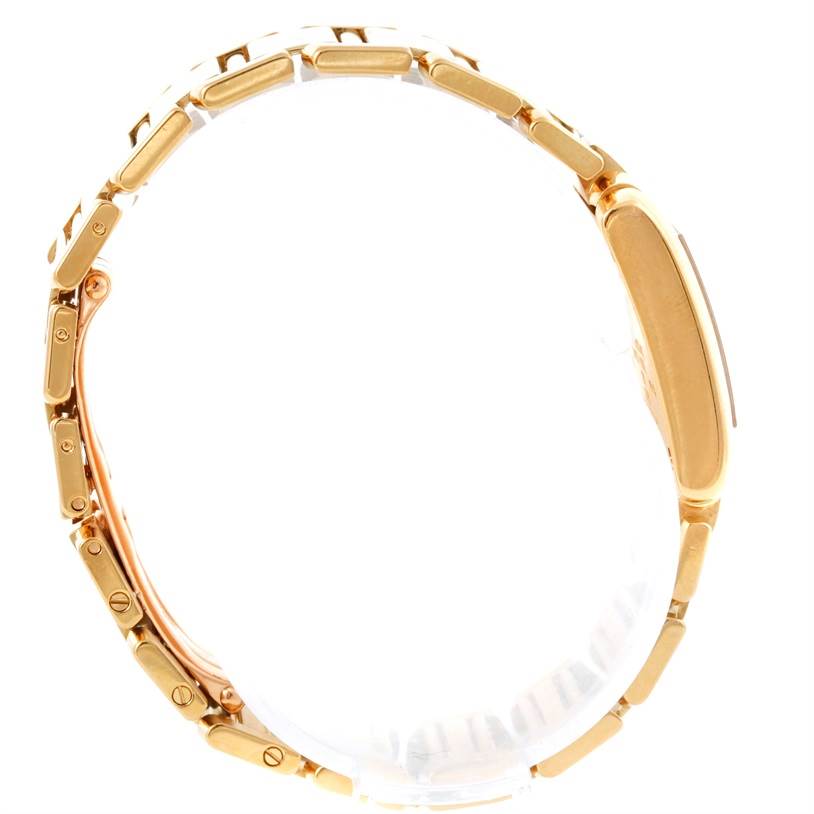 The image shows a side profile of the Cartier Tank Francaise W50002N2 Women's Yellow Gold Silver Dial W50002N2 Women's Yellow Gold Silver Dial watch, highlighting the gold bracelet and case.