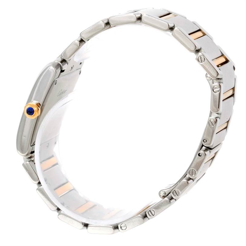 This image shows a Cartier Tank Francaise W51012Q4 Women's Steel and Gold (two tone) Silver Dial W51012Q4 Women's Steel and Gold (two tone) Silver Dial watch from the side, highlighting the metal bracelet and crown.