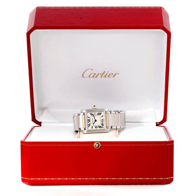 The Cartier Tank Française watch is shown in an open red box, viewed from the front.