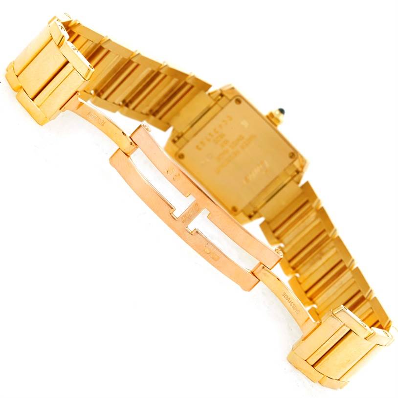 The image shows the back of a Cartier Tank Francaise W50002N2 Women's Yellow Gold Silver Dial W50002N2 Women's Yellow Gold Silver Dial watch, highlighting its bracelet and clasp.