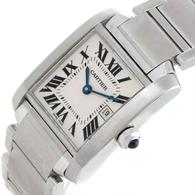 The image shows a Cartier Tank Française watch at an angle, displaying its face, bracelet, and crown with a blue cabochon.