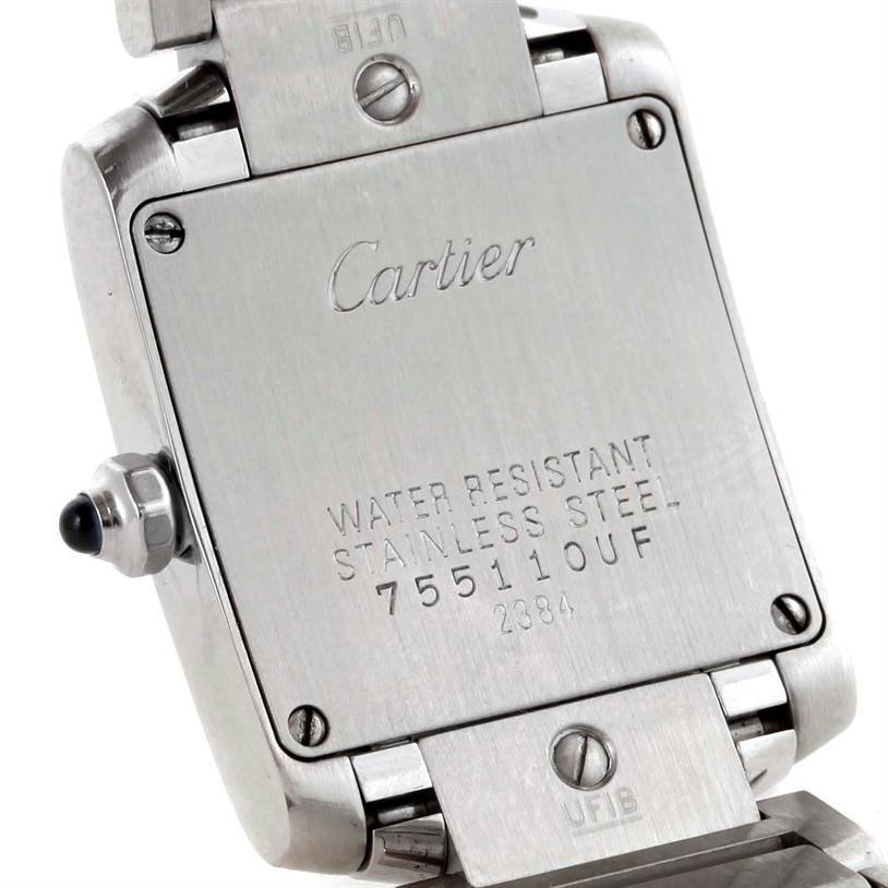 The image shows the back of the Cartier Tank Francaise W51008Q3 Women's Stainless Steel Silver Dial W51008Q3 Women's Stainless Steel Silver Dial watch, detailing its stainless steel case and water resistance.
