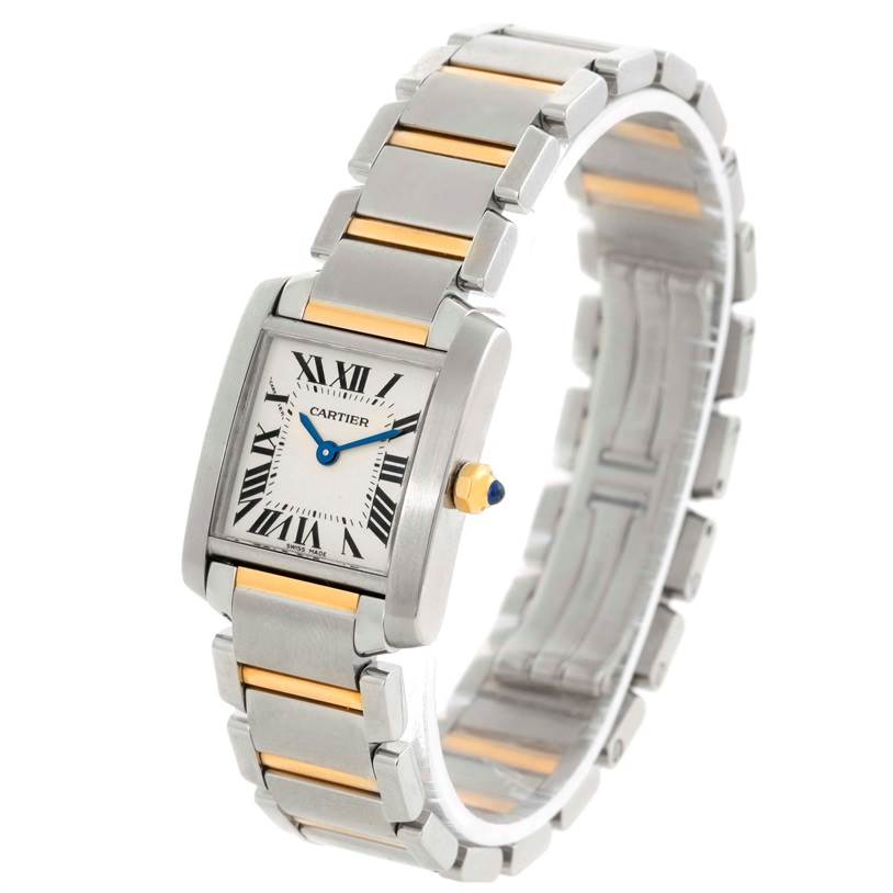 This image shows a Cartier Tank Française watch angled from the top left, detailing its face and metal bracelet with gold accents.