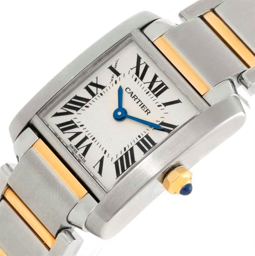 The image shows a Cartier Tank Francaise W51007Q4 Women's Steel and Gold (two tone) Silver Dial W51007Q4 Women's Steel and Gold (two tone) Silver Dial watch focused on the face, crown, and part of the bracelet.