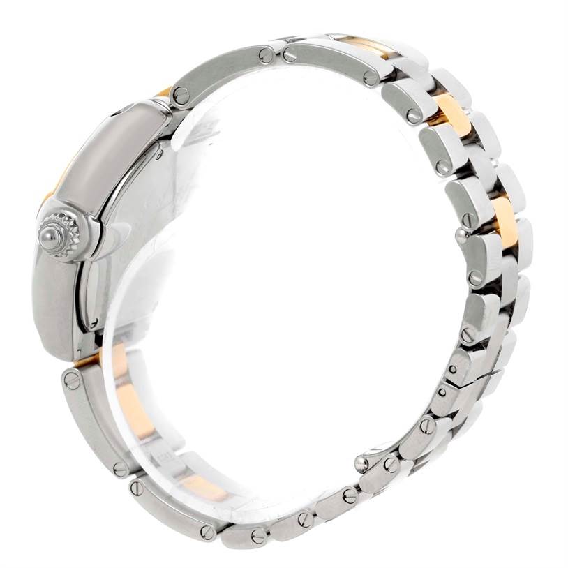 The image shows a side view of a Cartier Roadster W62026Y4 Women's Steel and Gold (two tone) Silver Dial W62026Y4 Women's Steel and Gold (two tone) Silver Dial watch highlighting the crown and part of the metal bracelet.