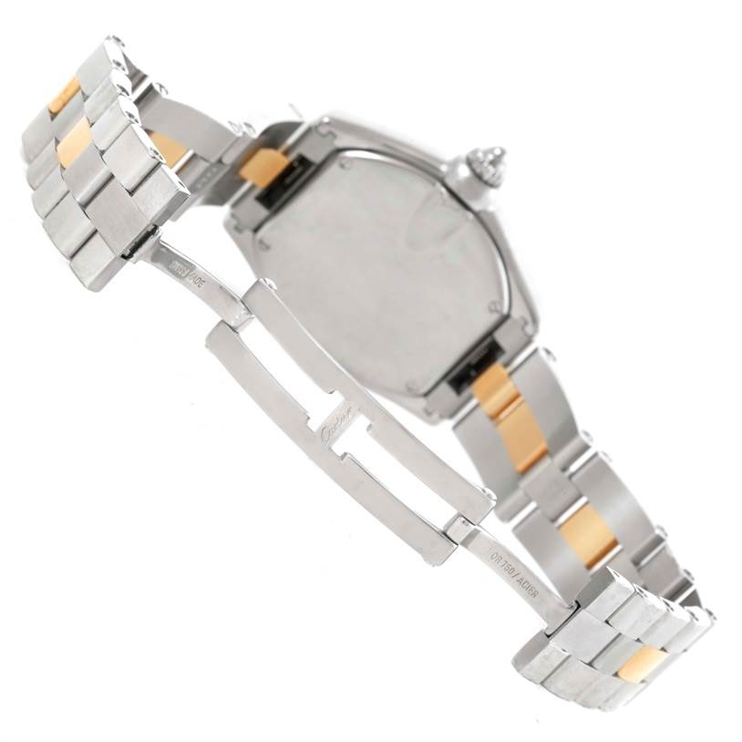 This image shows the open metal bracelet and clasp of a Cartier Roadster W62026Y4 Women's Steel and Gold (two tone) Silver Dial W62026Y4 Women's Steel and Gold (two tone) Silver Dial watch, viewed from the rear, focusing on the details of the strap.