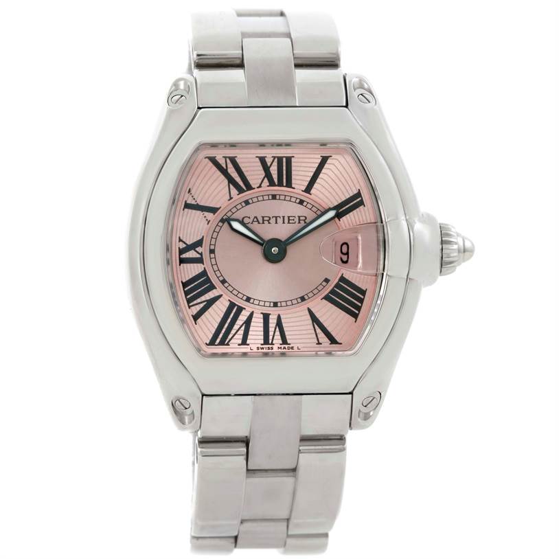 The image shows a Cartier Roadster W62017V3 Women's Stainless Steel Pink Dial W62017V3 Women's Stainless Steel Pink Dial watch from the front, highlighting its pink dial, Roman numerals, and metal bracelet.
