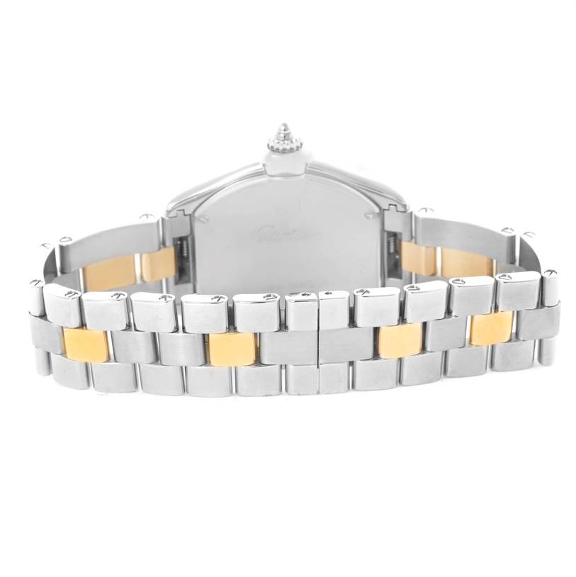 The image shows the rear view of a Cartier Roadster W62026Y4 Women's Steel and Gold (two tone) Silver Dial W62026Y4 Women's Steel and Gold (two tone) Silver Dial watch, focusing on the two-tone metal bracelet and back case.