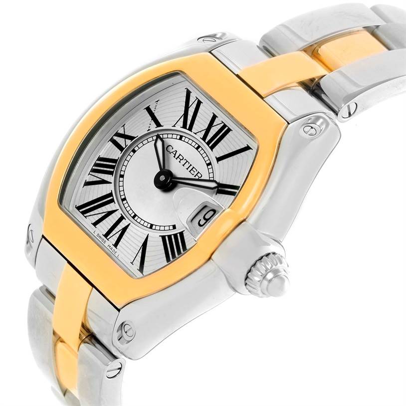 The Cartier Roadster W62026Y4 Women's Steel and Gold (two tone) Silver Dial W62026Y4 Women's Steel and Gold (two tone) Silver Dial watch is shown angled to display its face, bezel, part of the bracelet, and the crown.