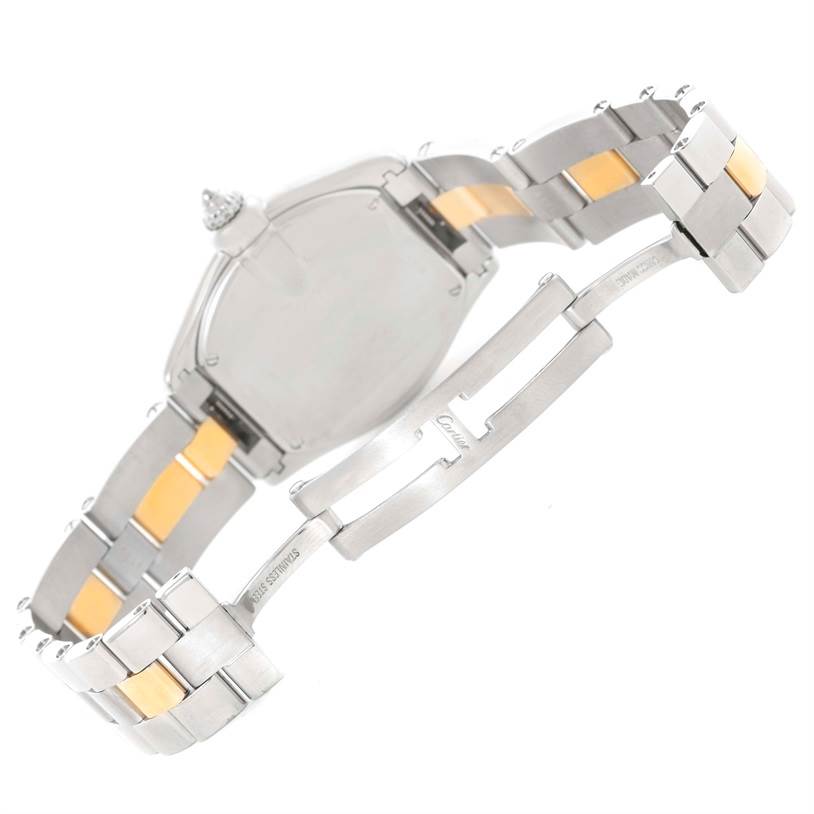 The image shows the back and partially opened clasp of a Cartier Roadster W62026Y4 Women's Steel and Gold (two tone) Silver Dial W62026Y4 Women's Steel and Gold (two tone) Silver Dial watch, highlighting its bracelet and case back.