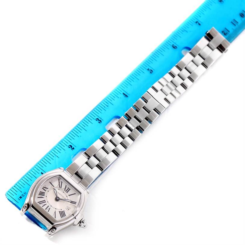 The image shows the face and metal bracelet of the Cartier Roadster W62016V3 Women's Stainless Steel Silver Dial W62016V3 Women's Stainless Steel Silver Dial model watch, with a measurement ruler beside it.