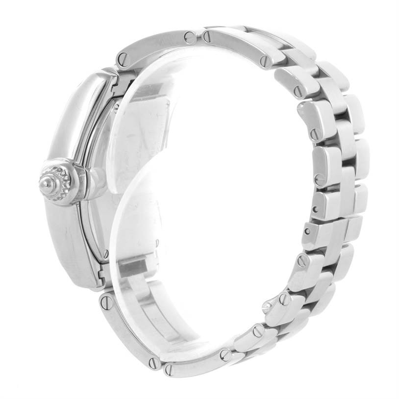 The image shows a side profile of the Roadster model by Cartier, highlighting the watch's bracelet and crown.