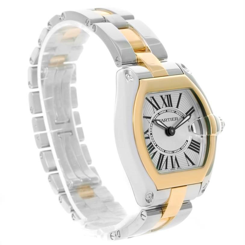 The Cartier Roadster W62026Y4 Women's Steel and Gold (two tone) Silver Dial W62026Y4 Women's Steel and Gold (two tone) Silver Dial watch is shown at an angle highlighting its two-tone bracelet, case, and dial details.